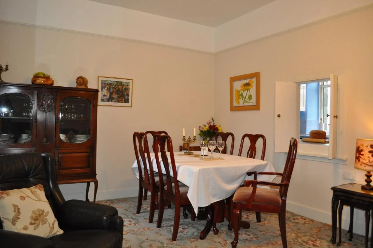 Dining table set for dinner in one of the Auchmore apartments