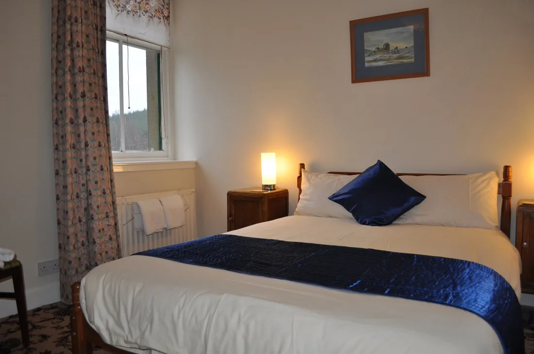 Double bedroom in the Tarmachan Apartment with views to Loch Tay and Ben Lawers